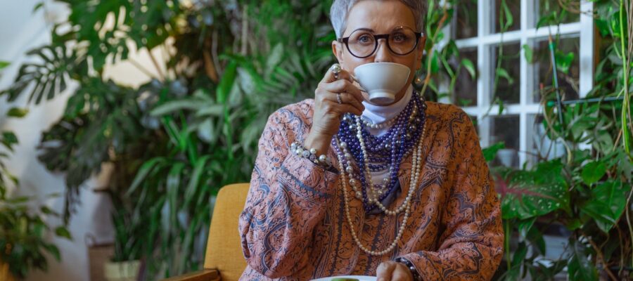 photo of woman drinking coffee