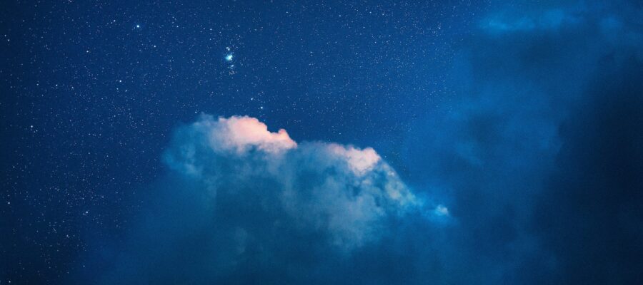 blue and white sky with stars