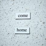 black text on white and black wall