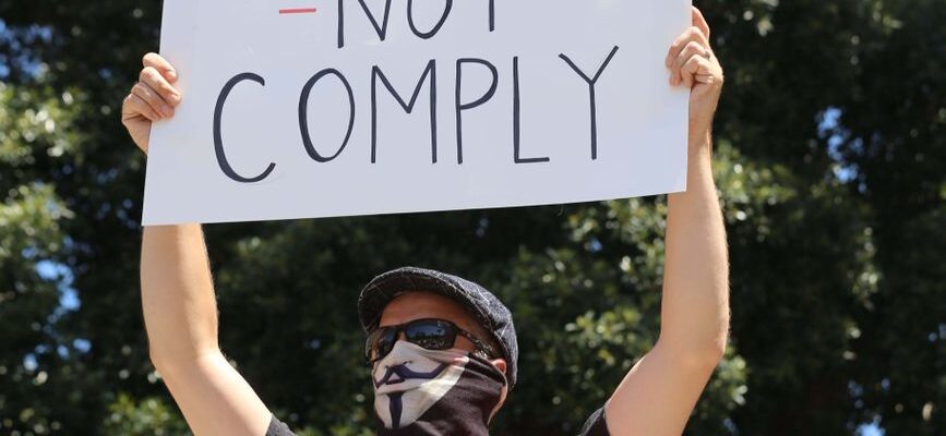protester with sign