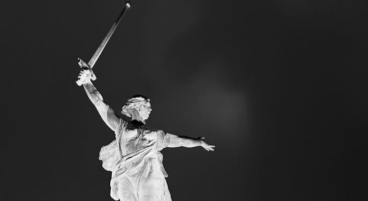 grayscale photo of a statue