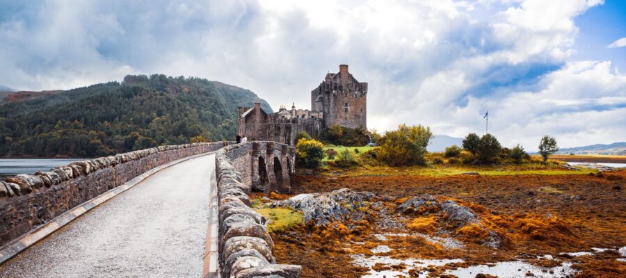 stone bridge leading to eilean donan castle