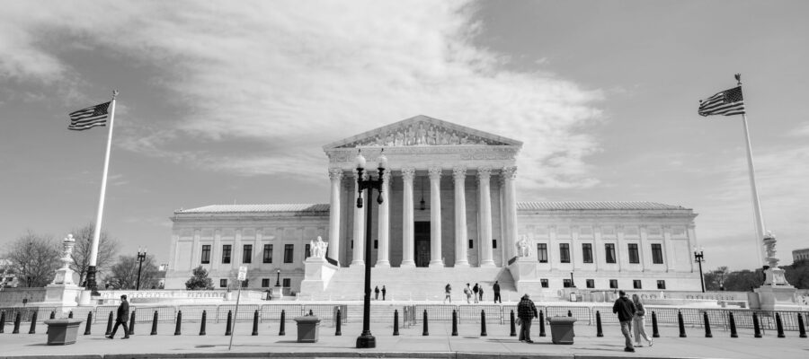 united states supreme court building in black and white