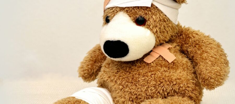 brown and white bear plush toy